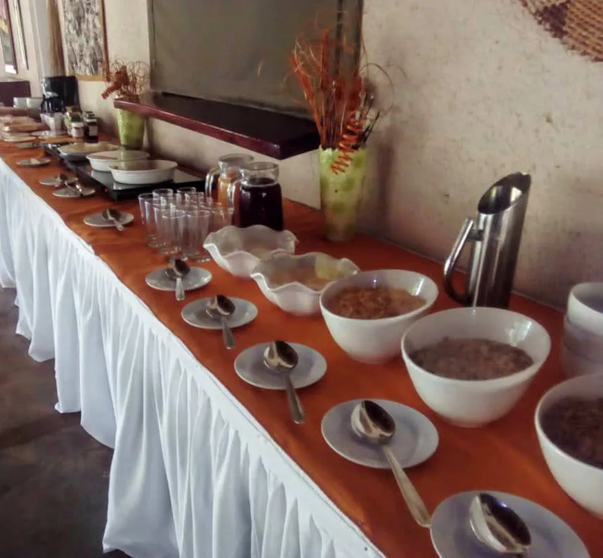 Breakfast buffet with cereals, juices and coffee