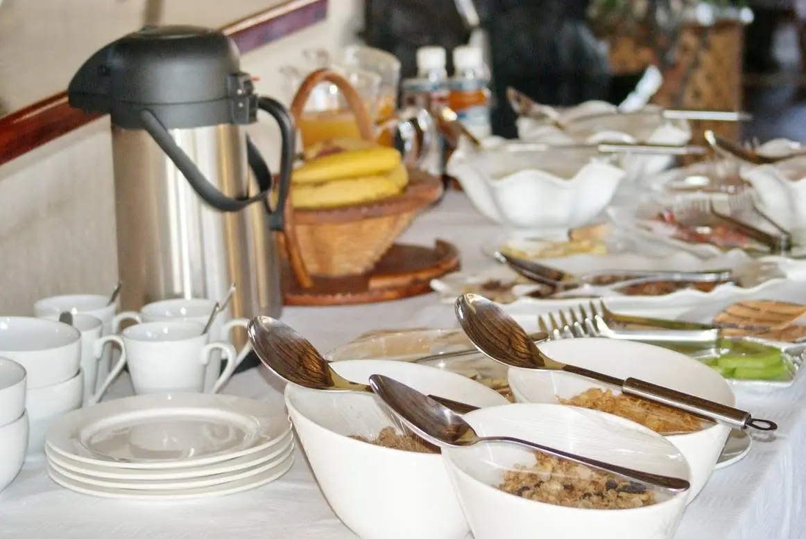Breakfast spread with fruit and cereals