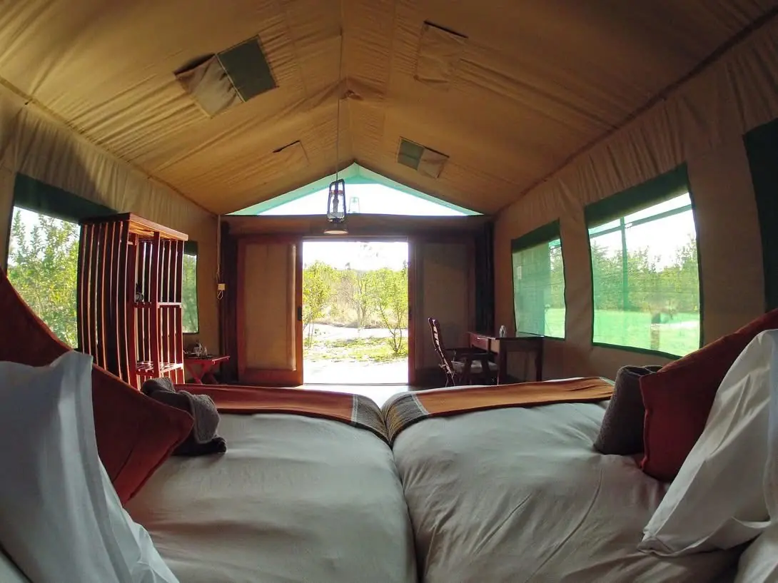 Wide view of a tented chalet interior