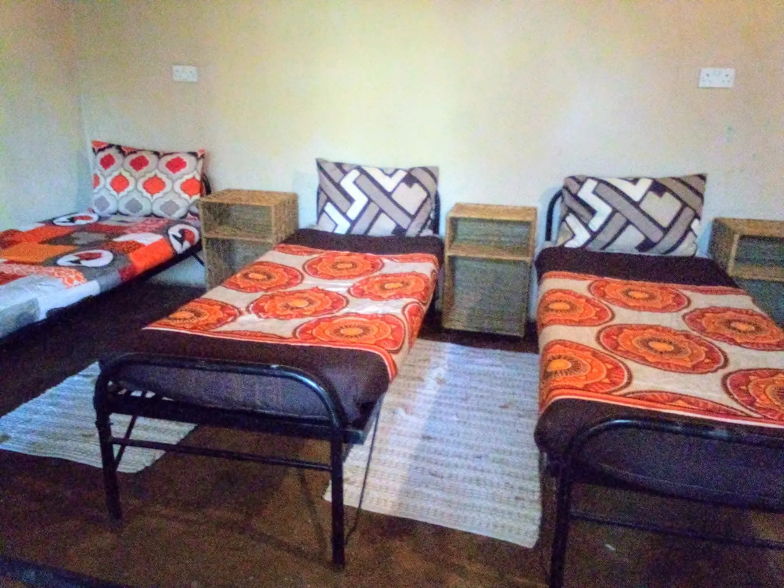 Dormitory with orange bedspreads