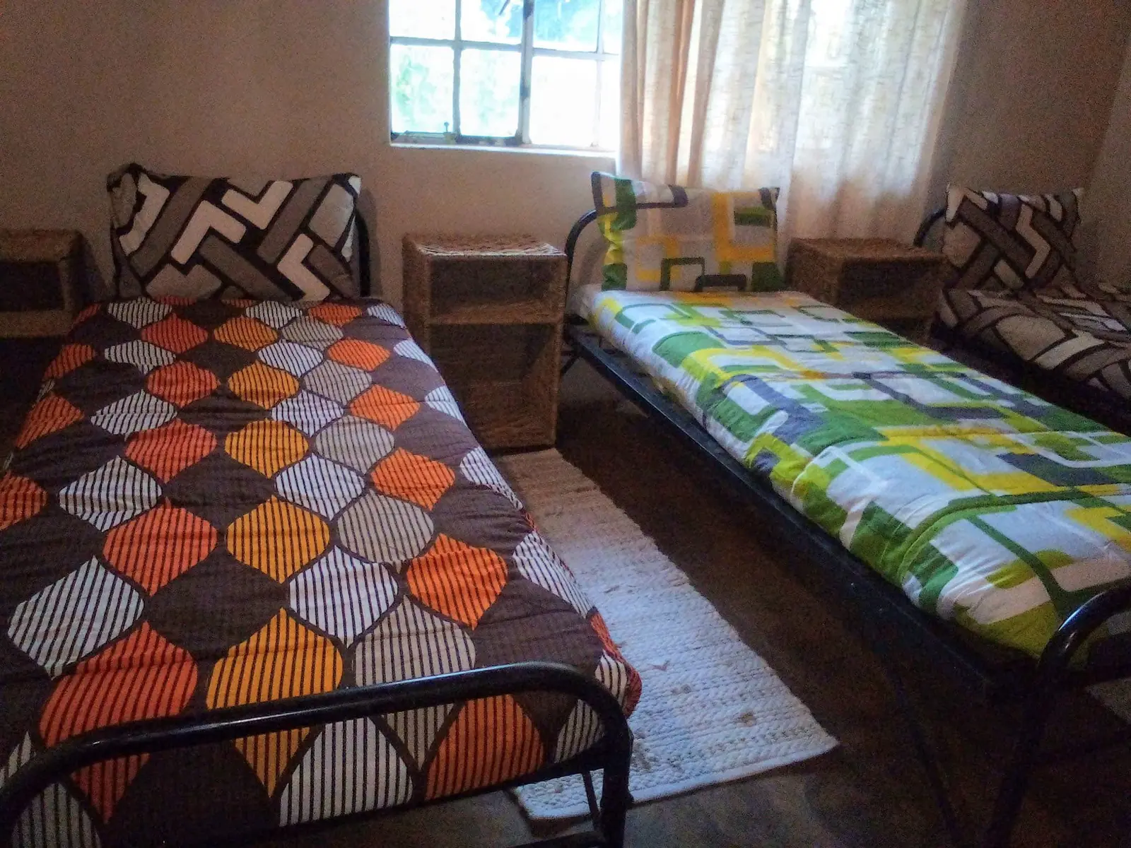 Dormitory with patterned bedspreads